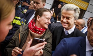Geert Wilders of the far-right Freedom party hands out flyers against the association treaty with Ukraine ahead of Wednesday’s referendum