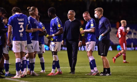 Oldham’s manager Keith Curle with his players during the Carabao Cup tie against Accrington.