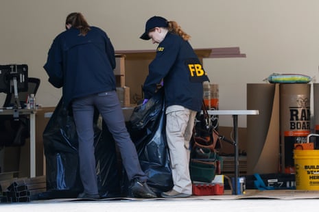 FBI agents search a home