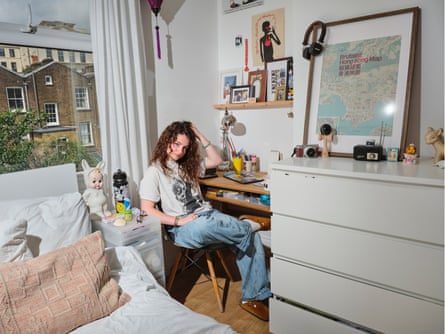 Anna photographed at a desk in her room