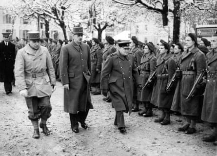 British prime minister Winston Churchill, Gen Charles de Gaulle and French Gen Jean de Lattre de Tassigny reviewing the troops in France, 13 November 1944