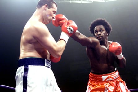 Harrison throws a punch at Derek McCafferty in 2001
