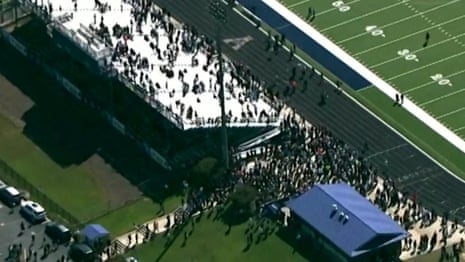 Aerial footage shows students evacuating football field after Georgia school shooting - VIDEO