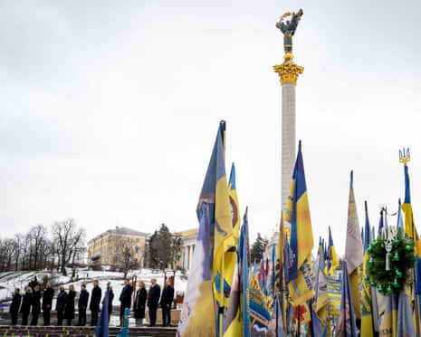 European leaders visit a makeshift memorial to fallen Ukrainian defenders at the Independent Square on the fourth anniversary of Russia's full-scale invasion, in Kyiv, Ukraine.