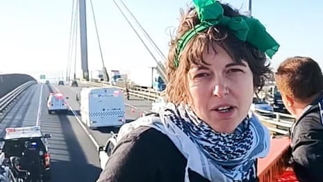 Climate protest on West Gate Bridge livestreamed before three arrests – video