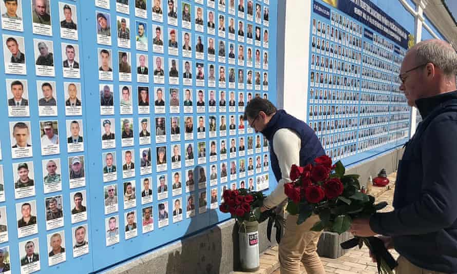 Russia-Ukraine war latest: Russia says Moskva warship has sunk after reported missile strike – live 2 Ukrainian foreign minister Dmytro Kuleba, left, and his Irish counterpart, Simon Coveney (right), lay flowers at a memorial wall to those Ukrainians killed Russia’s war on the country, in Kyiv on Thursday.