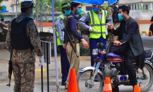 Coronavirus live news: China GDP shrinks 6.8% as Trump says 29 states could reopen 'relatively soon' 5 Troops continue to be deployed in the streets of Peshawar, Pakistan to maintain law and order amid the lockdown imposed to curb the spread of the Coronavirus in the country.