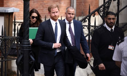 Britain’s Prince Harry, Duke of Sussex, leaves the high court in London