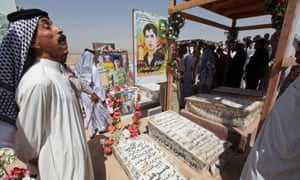 Residents visit the graves of their relatives.