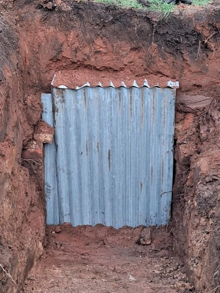 Entrance blocked with corrugated iron
