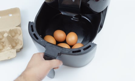 Small air fryer containing whole eggs