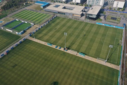Empty training courts after Jiangsu FC's financial collapse.