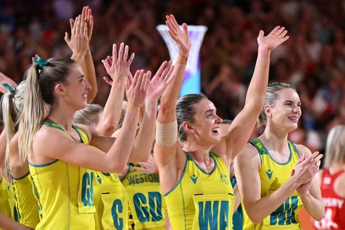 The Australian players celebrate their semi-final victory over England.