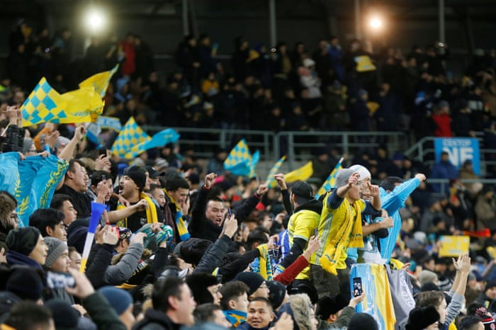 The Astana fans celebrate.