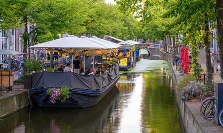 Restaurant boats on a canal in Delft