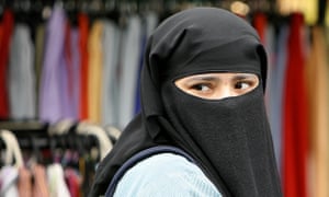 A woman wearing a veil