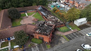 Aerial view of burnt-out buildings with the roofs and interior destroyed