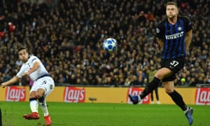 Tottenham Hotspur's Harry Winks sees this shot hit the bar.