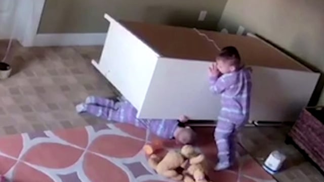 Toddler Lifts Chest Of Drawers Off Trapped Twin Brother Video