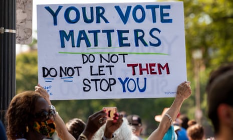Participants in a nationwide march for voting rights on the 58th anniversary of the March on Washington, 28 August 2021.