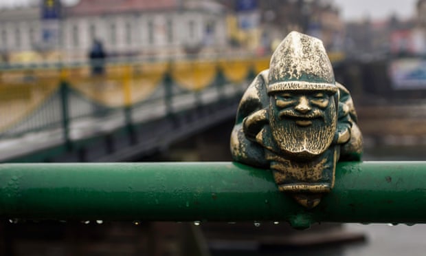 Little gnome statue on a bridge