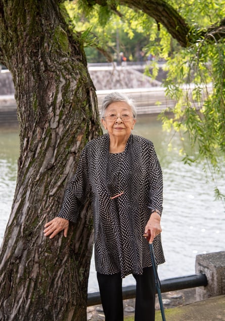 Koko Kondo leaning against a tree in Hiroshima Memorial Peace Park