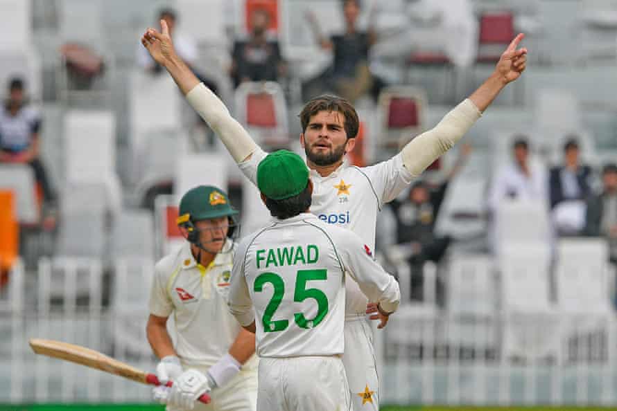 Australia bat towards safety on benign pitch in first Test against Pakistan | Cricket 2 Pakistan's Shaheen Shah Afridi celebrates after dismissing Marnus Labuschagne.
