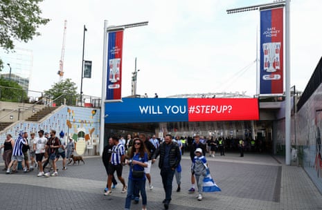 Fans make thgeir way down Wembley Way ahead of kick-off.