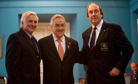 The Chilean president, Sebastian Pinera, centre, with Roberto Canessa, left, and Nando Parrado, right, in 2012.