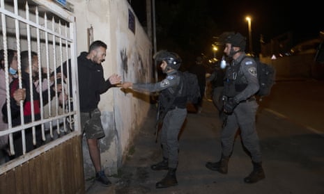 Israeli border police in Sheikh Jarrah, East Jerusalem, on 12 May.
