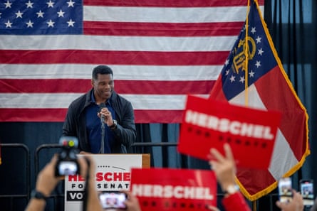 Republican Senate candidate Herschel Walker greets people at a campaign stop in Ellijay, Georgia, on Monday.
