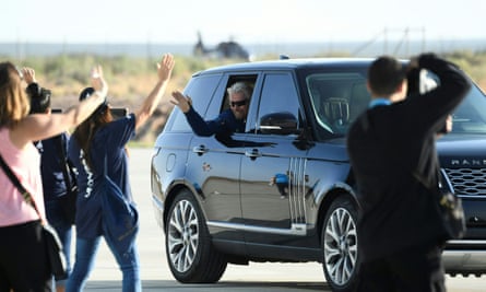 British billionaire Richard Branson waves as he arrives at Spaceport America on 11 July