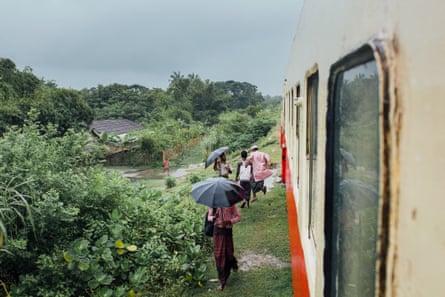 Rohingyas get off the train near a Rohingya village on the Sittwe-Zaw Pu Gyar line