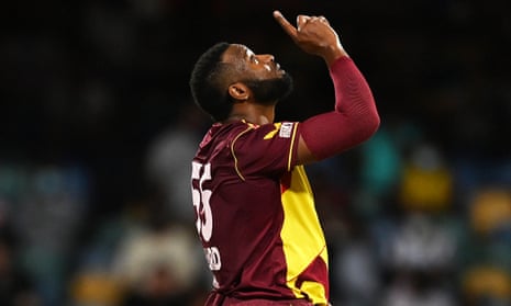 Kieron Pollard of West Indies celebrates taking the wicket of Moeen Ali of England.
