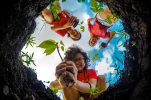 Photographer of the Year shortlisted: Young volunteers by Froi Rivera in Cavite, Philippines The three volunteers are seen happy and content during their tree-planting activity