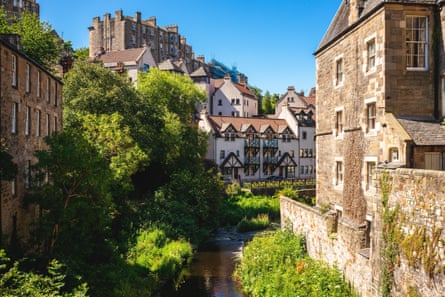 Stream and old buildings in Scotland