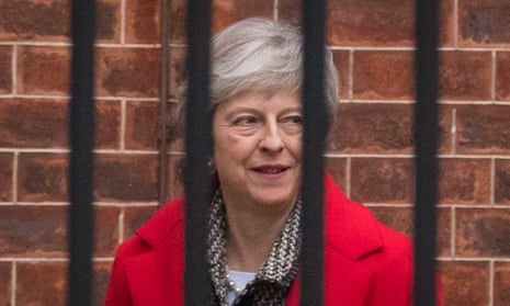 Theresa May at the rear entrance of No 10 Downing Street on Friday.