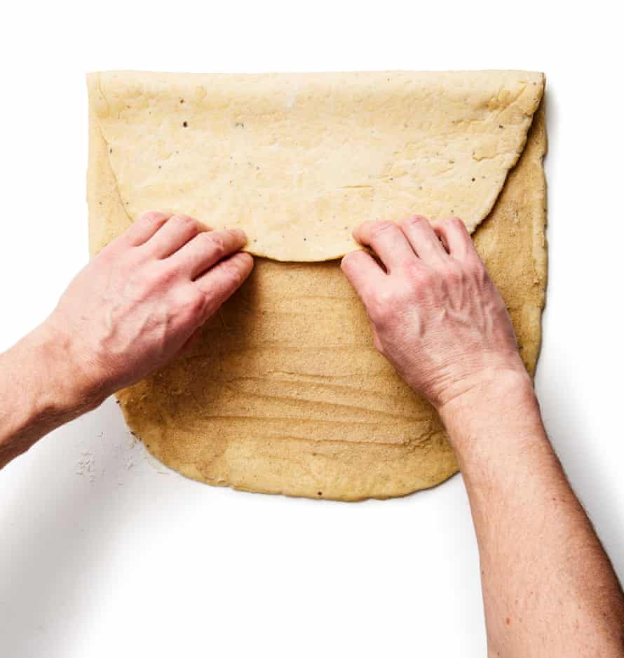 Felicity Cloake’s perfect cardamom buns – step 6a. Fold the top third of the dough into the middle, then fold the bottom third up on top of it, as if folding a letter.