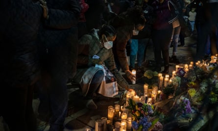 Community members attend a vigil in memory of Xavier Louis-Jacques, 19, of Cambridge, Massachusetts. US homicides rose in 2020.