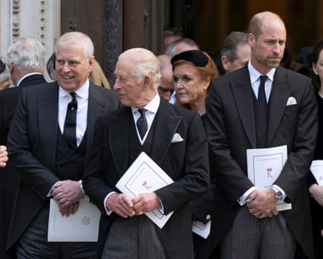 Prince Andrew, King Charles and Prince William at the funeral service for the Duchess of Kent: they stand in front of a group of people including Sarah Ferguson at Westminster Cathedral, wearing black suits and ties.