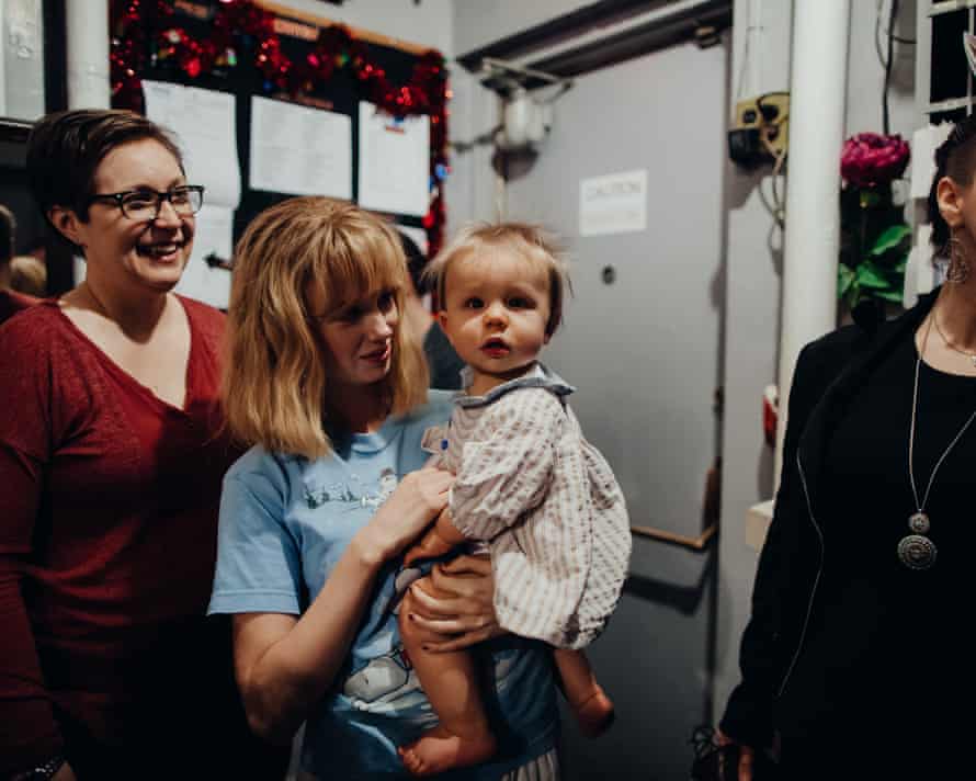 Understudy moment … actor Carla Langley holds baby actor Rafael while his mother, Kat West, stands by, backstage at The Ferryman.