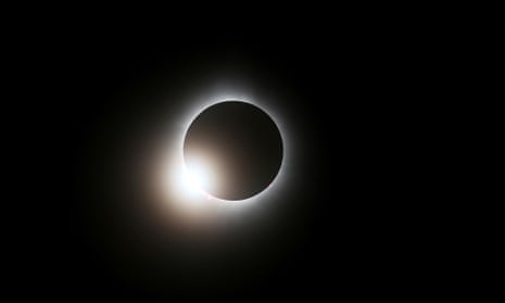 People assemble to view the total solar eclipse at Sugarbush ski resort<br>The eclipse passes through totality at Sugarbush ski resort in Warren, Vermont, U.S. April 8, 2024.  REUTERS/Lauren Owens Lambert