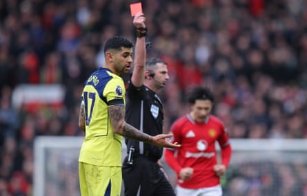 Cristian Romero is sent off by referee Michael Oliver