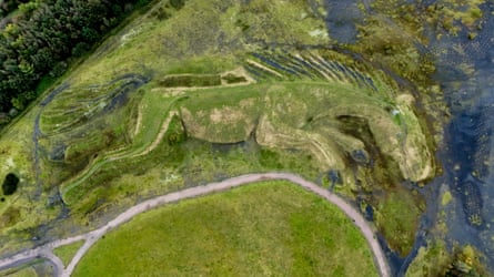 Earth sculpture of a pony made of coal shale rock