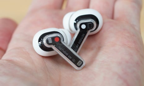 Nothing Ear 2 review earbuds in the palm of a hand.