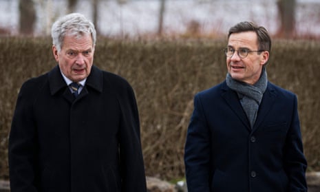 Finland's president, Sauli Niinistö, left, and Sweden's prime minister, Ulf Kristersson, arrive to attend a security meeting in southern Sweden on 22 February.