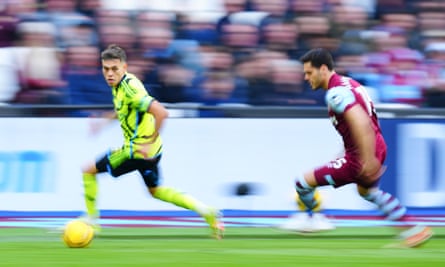Leandro Trossard is followed by Konstantinos Mavropanos during Arsenal’s win over West Ham.