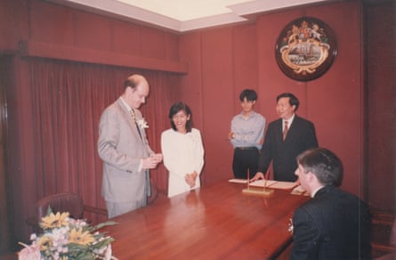 Four weddings ... at their first ceremony, at a Hong Kong registry office.
