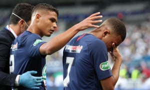 Kylian Mbappé is consoled by Thiago Silva after a bad challenge from Loïc Perrin forced him off in the French Cup final.