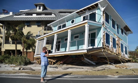 TOPSHOT-US-WEATHER-HURRICANE-AFTERMATH<br>TOPSHOT - Claire mourns as she sees the damage caused by Hurricane Michael in Mexico Beach, Florida on October 12, 2018. - In devastated Mexico Beach, where Hurricane Michael unleashed its most violent rains and winds, residents are taking stock of the damage, reuniting with their loved ones -- and bracing for what will be a long, difficult clean-up operation. (Photo by HECTOR RETAMAL / AFP)HECTOR RETAMAL/AFP/Getty Images